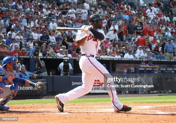 Jason Heyward of the Atlanta Braves hits a 3 run home run against the Chicago Cubs during Opening Day at Turner Field on April 5, 2010 in Atlanta,...