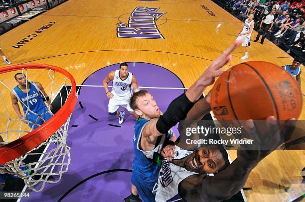 Joey Dorsey of the Sacramento Kings looks to score against Oleksiy Pecherov of the Minnesota Timberwolves during the game on March 14, 2010 at ARCO...