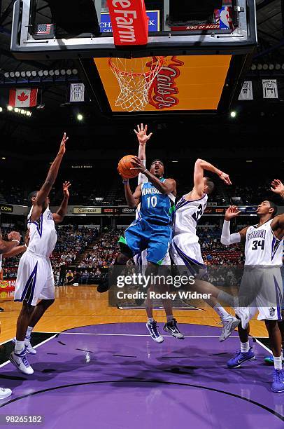 Jonny Flynn of the Minnesota Timberwolves takes the ball to the basket against Francisco Garcia of the Sacramento Kings during the game on March 14,...