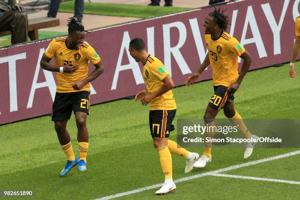 Michy Batshuayi of Belgium celebrates with teammates Dedryck Boyata of Belgium and Yannick Ferreira Carrasco of Belgium after scoring their 5th goal...