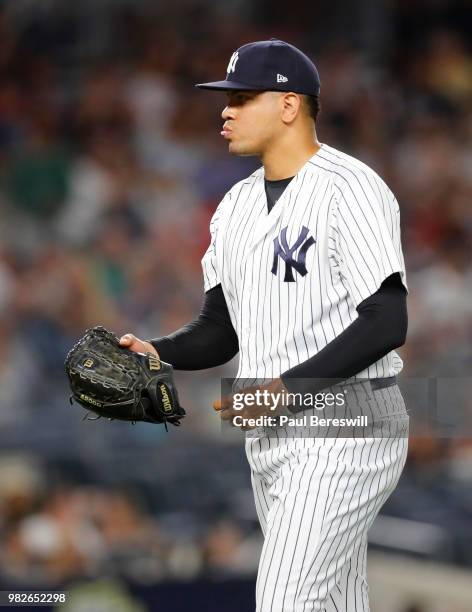 Pitcher Dellin Betances of the New York Yankees reacts as he leaves the mound after retiring the side in the 8th inning in an MLB baseball game...