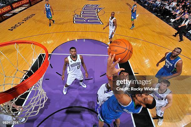Ryan Hollins of the Minnesota Timberwolves and Jason Thompson of the Sacramento Kings go after a rebound during the game on March 14, 2010 at ARCO...