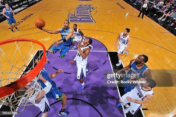 Wayne Ellington of the Minnesota Timberwolves lays up a shot against Jason Thompson of the Sacramento Kings during the game on March 14, 2010 at ARCO...