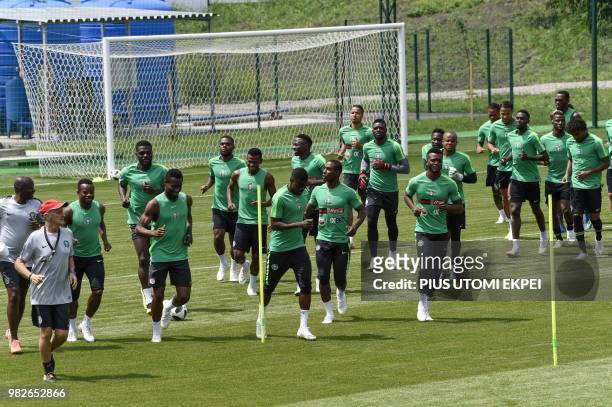 Nigeria's players warm up during a training session at Essentuki Arena in southern Russia on June 24 during the Russia 2018 World Cup football...