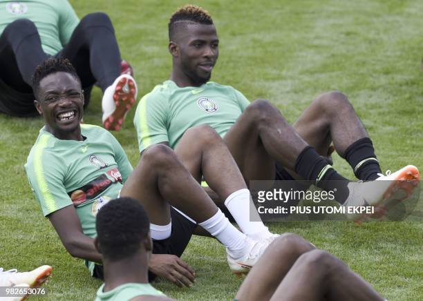 Nigeria's forward Ahmed Musa and forward Kelechi Iheanacho attend a training session at Essentuki Arena in southern Russia on June 24 during the...