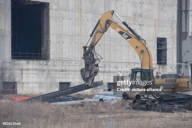 Construction vehicle disposing parts of abandoned reactor blocks 7 and 8 at a nuclear power plant in Lubmin, Germany, 25 January 2018. Originally...