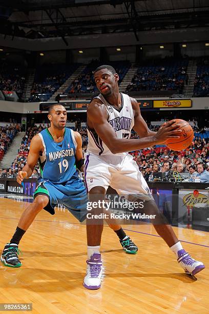 Tyreke Evans of the Sacramento Kings moves the ball against Wayne Ellington of the Minnesota Timberwolves during the game on March 14, 2010 at ARCO...