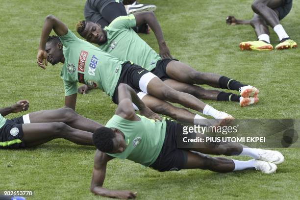 Nigeria's forwards Ahmed Musa and Kelechi Iheanacho and teammates attend a training session at Essentuki Arena in southern Russia on June 24 during...
