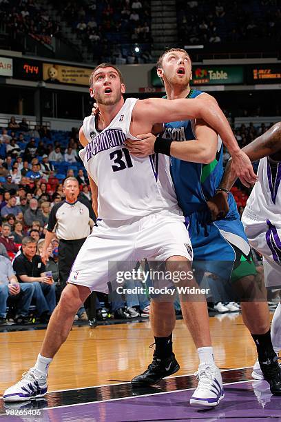 Spencer Hawes of the Sacramento Kings rebounds against Oleksiy Pecherov of the Minnesota Timberwolves during the game on March 14, 2010 at ARCO Arena...