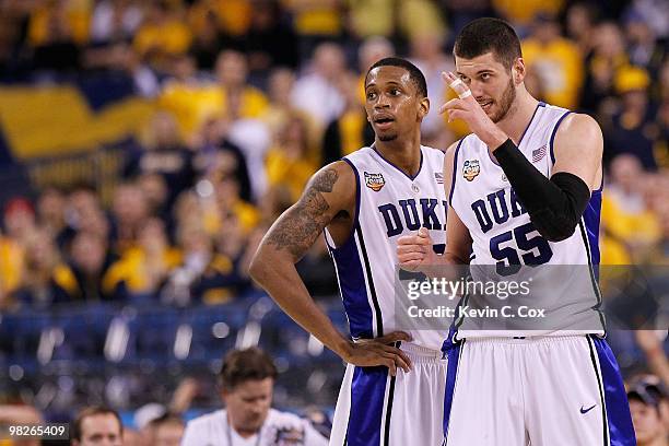 Lance Thomas and Brian Zoubek of the Duke Blue Devils stand on the court while taking on the West Virginia Mountaineers during the National Semifinal...