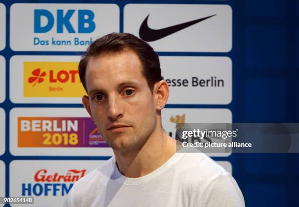 File picture dated shows French pole vaulter Renaud Lavillenie smiling before a press conference ahead of the following day's Istaf Indoor event, in...