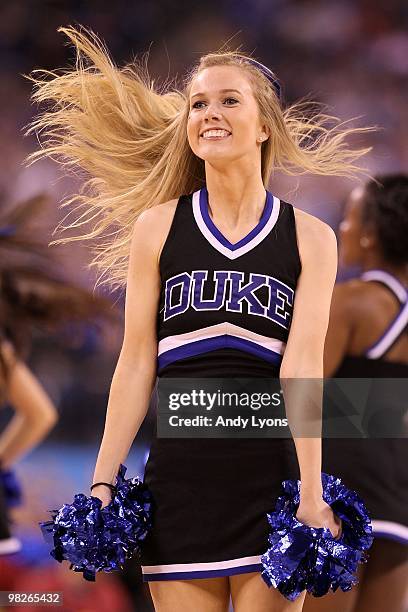 Duke Blue Devils cheerleader performs during a break in the game against the West Virginia Mountaineers during the National Semifinal game of the...