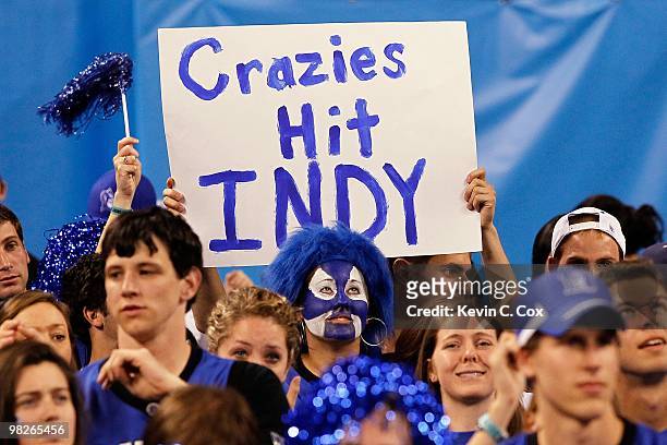 Fans of the Duke Blue Devils hold up signs from the student section while taking on the West Virginia Mountaineers during the National Semifinal game...