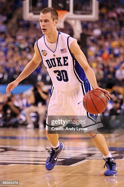 Jon Scheyer of the Duke Blue Devils moves the ball while taking on the West Virginia Mountaineers during the National Semifinal game of the 2010 NCAA...