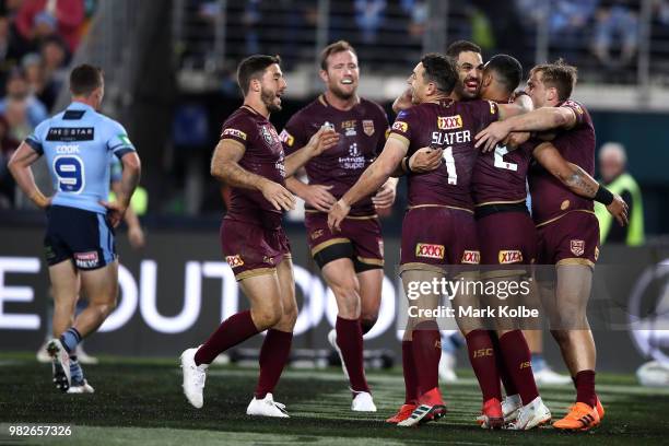 Valentine Holmes of the Maroons celebrates scoring a try with Greg Inglis of the Maroons during game two of the State of Origin series between the...