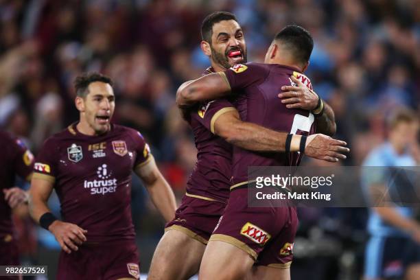 Valentine Holmes of the Maroons celebrates with Greg Inglis after scoring a try during game two of the State of Origin series between the New South...