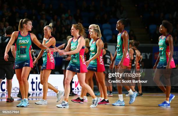 Tegan Philip of the Vixens and her teammates leave the court during the round eight Super Netball match between Magpies and the Vixens at Margaret...