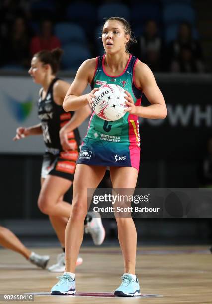 Kate Moloney of the Vixens controls the ball during the round eight Super Netball match between Magpies and the Vixens at Margaret Court Arena on...
