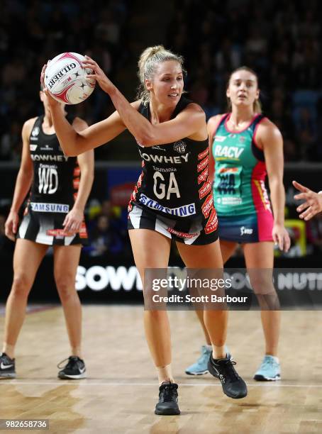 Erin Bell of the Magpies controls the ball during the round eight Super Netball match between Magpies and the Vixens at Margaret Court Arena on June...