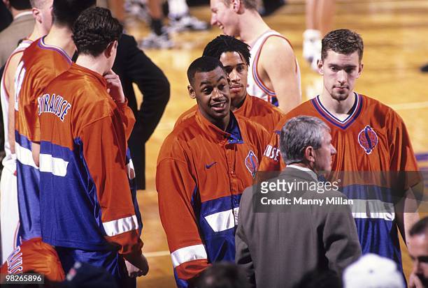 Big East Tournament: Syracuse Donovan McNabb victorious with teammates on court after winning game vs Boston College. New York, NY 3/7/1996 CREDIT:...