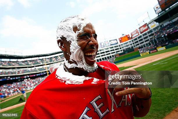 Right fielder Nelson Cruz of the Texas Rangers reacts to a post-game cream pie in his face after the Rangers beat the Toronto Blue Jays 5-4 on...