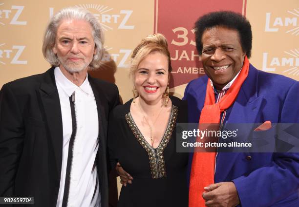 Lambertz manager Hermann Buehlbecker greets entertainer Roberto Blanco and his wife Luzandra at the 'Lambertz Monday Night' event in Cologne,...