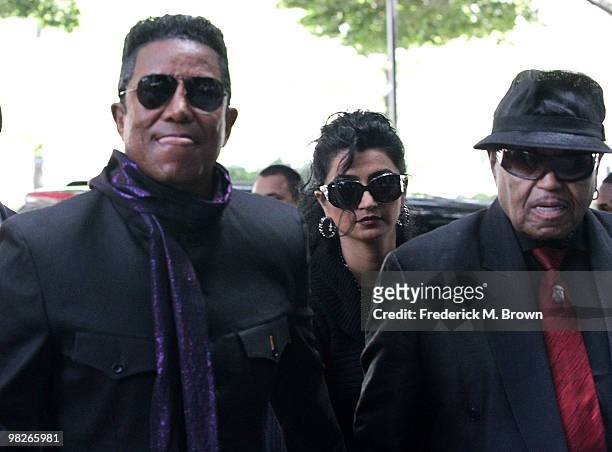 Jermaine Jackson, his wife and Joe Jackson enter the Los Angeles Criminal Courts building for the court appearance of Dr. Conrad Murray on April 5,...