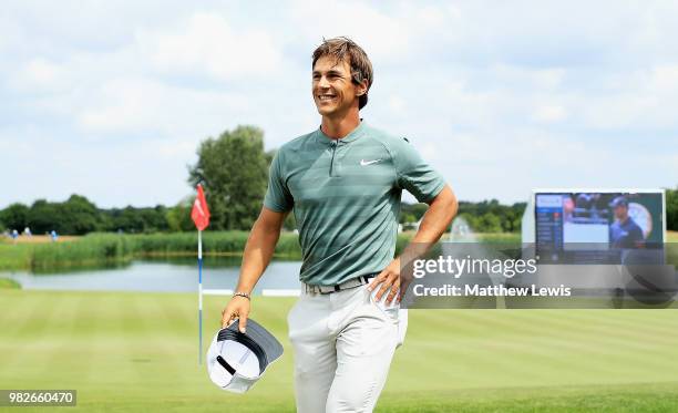 Thorbjorn Olesen of Denmark looks on, after his round during day four of the BMW International Open at Golf Club Gut Larchenhof on June 24, 2018 in...