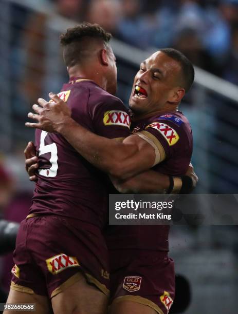 Dane Gagai of the Maroons celebrates with Will Chambers after scoring a try during game two of the State of Origin series between the New South Wales...