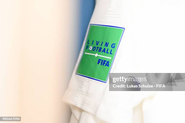 Detailed view of a FIFA Living Football badge is seen on the sleeve of an England shirt inside the England dressing room prior to the 2018 FIFA World...