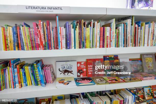 Portugal, Lisbon, Park of the Nations, Livraria Almedina, bookstore children's literature shelves.