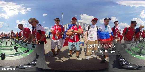 Fans play table football outside the stadium prior to the 2018 FIFA World Cup Russia group G match between England and Panama at Nizhny Novgorod...