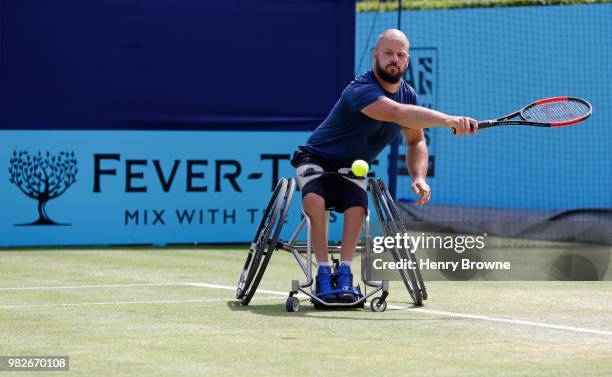 Stefan Olsson of Sweden plays a shot during the men's wheelchair final against Stephane Houdet of France during Day 7 of the Fever-Tree Championships...