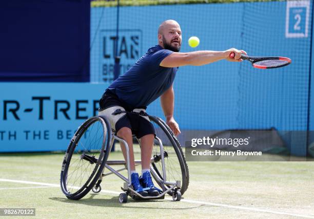 Stefan Olsson of Sweden plays a shot during the men's wheelchair final against Stephane Houdet of France during Day 7 of the Fever-Tree Championships...