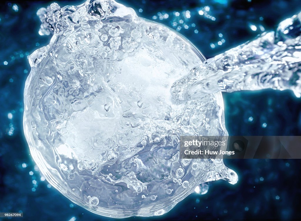 Water pouring into glass