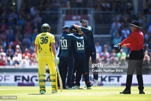 England players celebrates as Jos Buttler runs out Tim Paine during the 5th Royal London ODI match between England and Australia at Emirates Old...