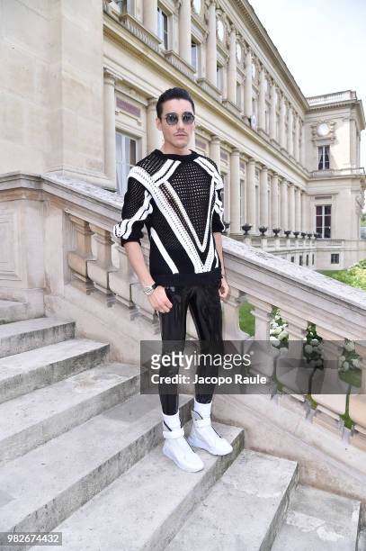 Hu Bing attends the Balmain Menswear Spring/Summer 2019 show as part of Paris Fashion Week on June 24, 2018 in Paris, France.