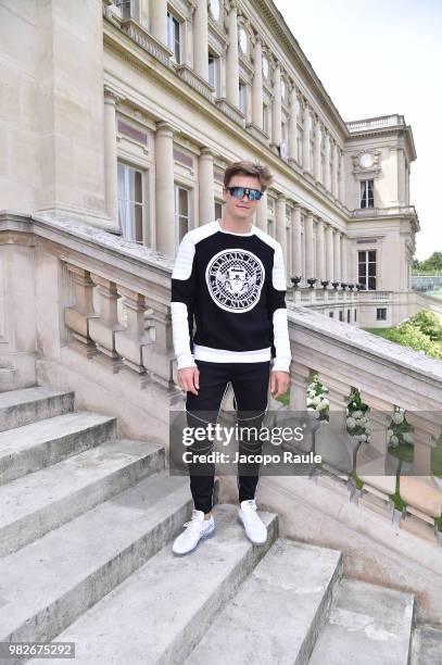 Oliver Cheshire attends the Balmain Menswear Spring/Summer 2019 show as part of Paris Fashion Week on June 24, 2018 in Paris, France.