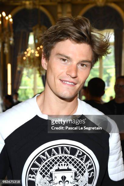 Oliver Cheshire attends the Balmain Menswear Spring/Summer 2019 show as part of Paris Fashion Week on June 24, 2018 in Paris, France.