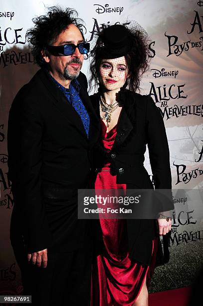 Director Tim Burton and actress Helena Boham Carter attend the "Alice Au Pays des Merveilles" - Paris Premiere at the Theatre Mogador on March 15,...