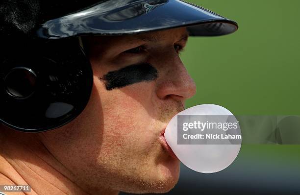 Chris Coghlan of the Florida Marlins waits to bat against the New York Mets during their Opening Day Game at Citi Field on April 5, 2010 in the...