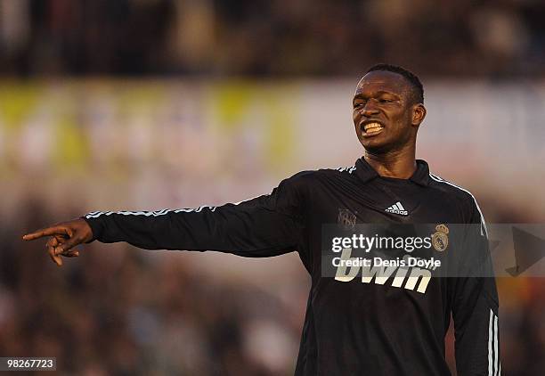 Mahamadou Diarra of Real Madrid points during the La Liga match between Racing Santander and Real Madrid at El Sardinero stadium on April 4, 2010 in...