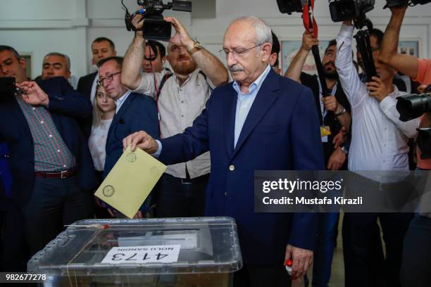 Turkey's main opposition Republican People's Party Kemal Kilicdaroglu, casts his ballot at a polling station during a presidential and parliamentary...