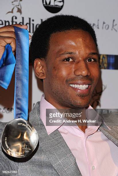 Olympian Shani Davis attends the 8th annual "Dressed To Kilt" Charity Fashion Show presented by Glenfiddich at M2 Ultra Lounge on April 5, 2010 in...