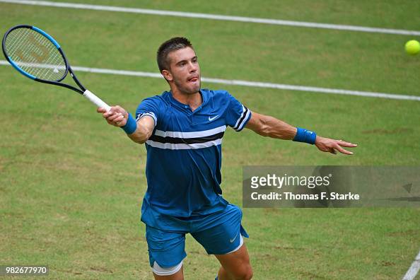 Borna Coric of Croatia plays a forehand in the final match against ...