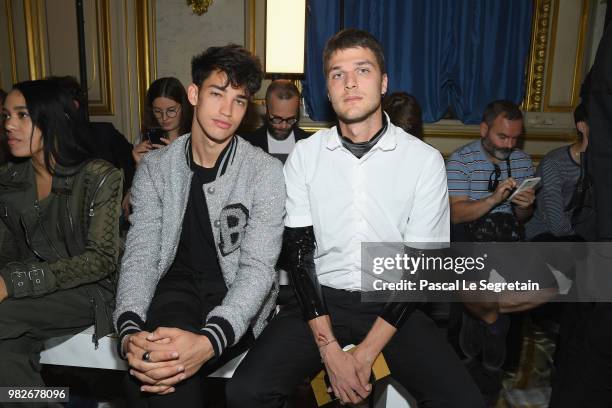 Jessey Stevens and Guido Milani attend the Balmain Menswear Spring/Summer 2019 show as part of Paris Fashion Week on June 24, 2018 in Paris, France.