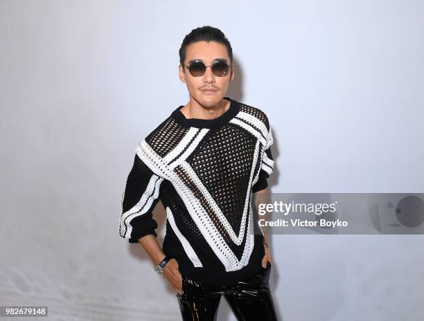 Hu Bing attends the Balmain Menswear Spring/Summer 2019 show as part of Paris Fashion Week on June 24, 2018 in Paris, France.