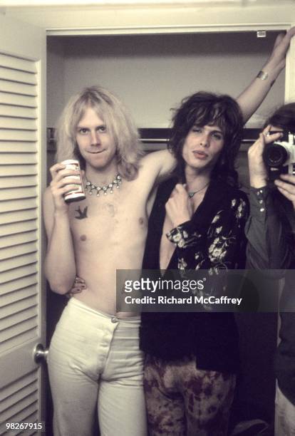Tom Hamilton and Steven Tyler of Aerosmith posing backstage in 1973 in Newport, Rhode Island.