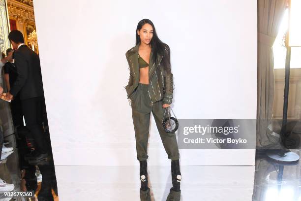 Aleali May attends the Balmain Menswear Spring/Summer 2019 show as part of Paris Fashion Week on June 24, 2018 in Paris, France.