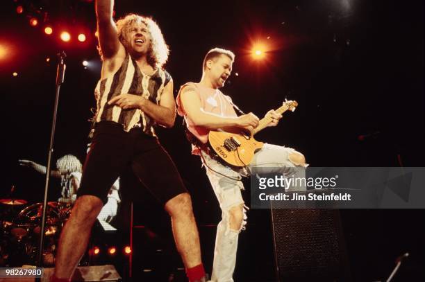 Van Halen vocalist Sammy Hagar and guitarist Eddie Van Halen perform at the Target Center in Minneapolis, Minnesota on July 30, 1995.